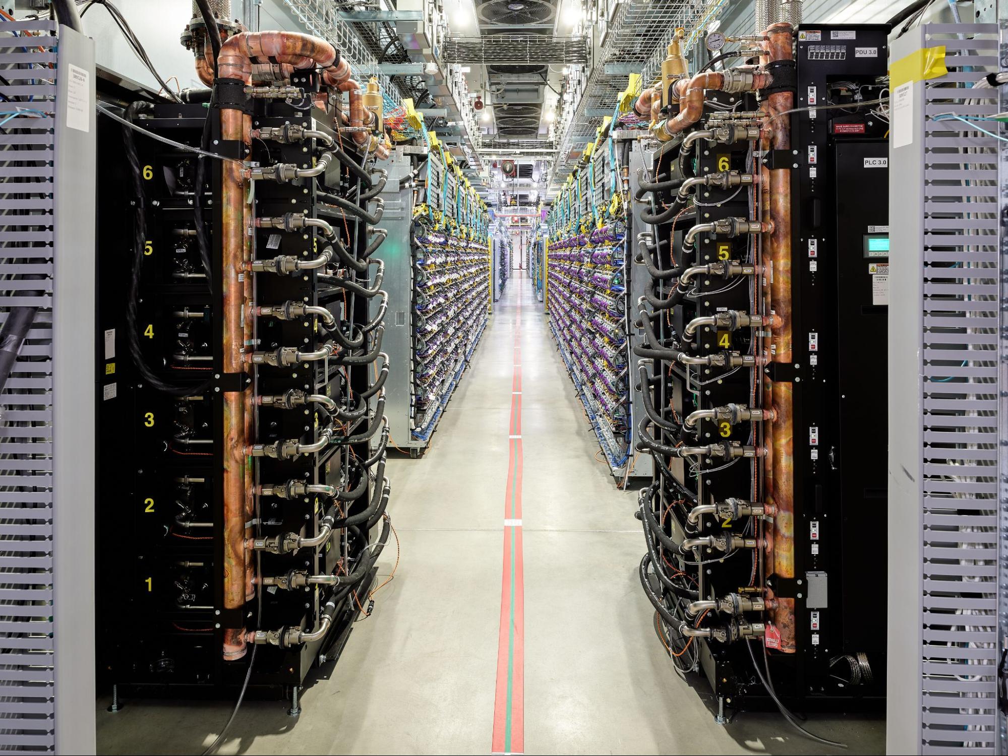 Interior view of a liquid-cooled server aisle at Google's New Albany, Ohio, data center.