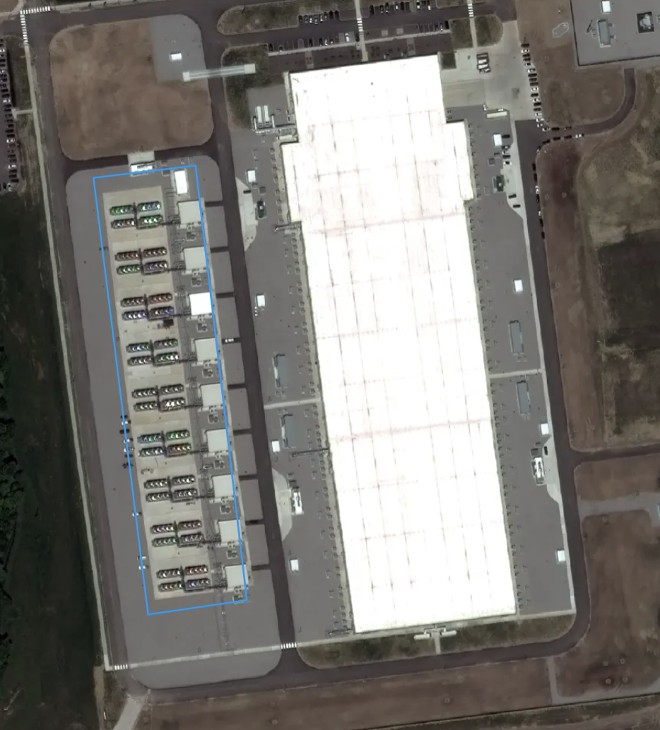 Satellite view of a Meta Prometheus data center building, with cooling equipment outlined in blue.